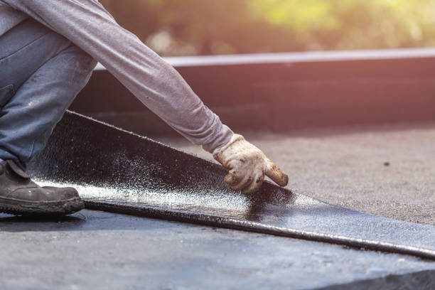 Professional Basement Waterproofing technician working in Atlas, MI